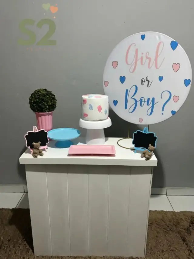 Chá revelação com painel Girl or Boy e mesa com bolo e doces